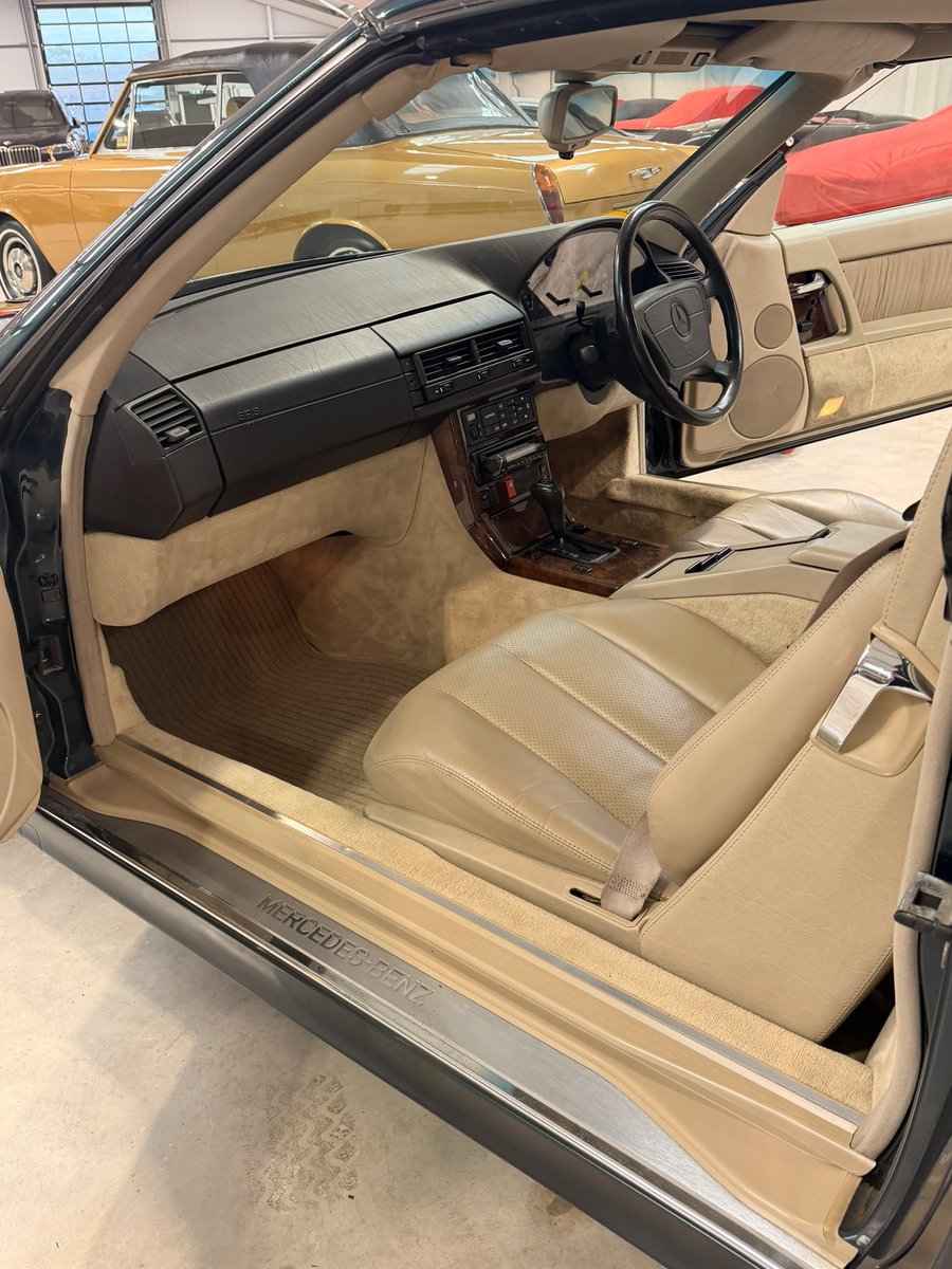 ListerLawrence's tweet photo. When I was 11 years old I attended a comprehensive high school in Burnley. My English Teacher, Mrs Langstroth, came to school in this brand new Tourmaline Green SL320 - Needless to say I was awestruck! This was at a time when if you had a new SL you were really someone! (£63k list price in 1994 is like £150k now). I ran over and said “Wow Miss that is a nice car”!! 

It turned out that her husband was a multi millionaire and had bought it for her 40th Birthday present. I used to bump into her from time to her every 5 or so years after I left school, as you do with past teachers, and I always asked about it and told her if she ever sold it I wanted it…. Sadly her husband had died and she was very attached to the car. 

However last year, she finally agreed to let me buy it from her on the proviso I keep it forever. She even let me keep
Her private reg (SL were her initials too)! It feels special as this was probably one of the first ‘nice’ cars I ever came into contact with and it feels such a privilege to look after it on behalf of Mrs L! ♥️