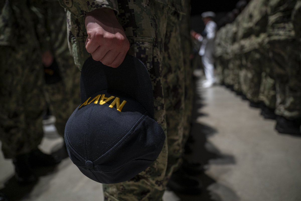 NavyRTC's tweet photo. RTC was honored to host Rear Adm. Mark Behning, Acting Deputy Chief of Naval Operations for Warfighting Requirements and Capabilities, during the capping ceremony at boot camp. The ceremony signifies recruits becoming Sailors at the end of RTC’s crucible event, Battle Stations. https://t.co/FawiOT8DJp