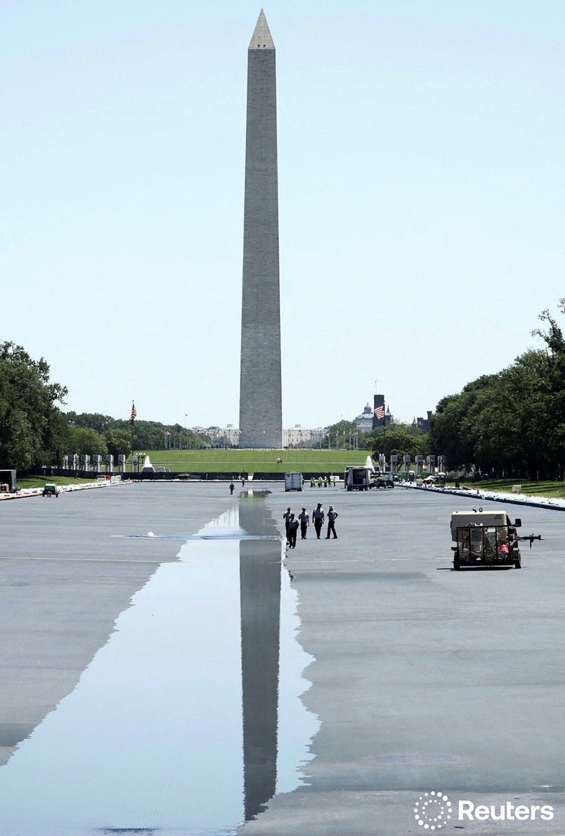 BoKnowsNews's tweet photo. National Park employees walk along the reflecting pool as it is refilled with water after being painted at the directive of U.S. President Donald Trump ahead of America 250, in Washington, D.C., U.S., June 4, 2026. REUTERS/Kevin Lamarque https://t.co/lI2H5m7AJA