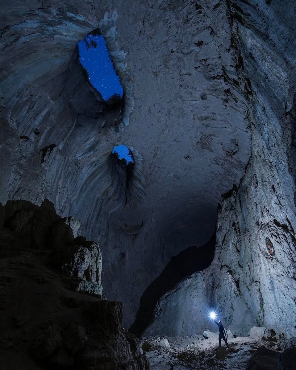 ScienceXnature's tweet photo. The "Eyes of God"is the nickname for Prohodna Cave, a famous cave in northern Bulgaria. https://t.co/yfjHxmiDj3