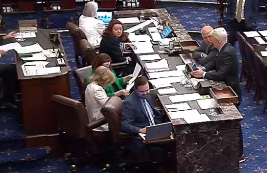 jamiedupree's tweet photo. Tillis &amp; Cassidy hand off papers to the Senate Parliamentarian, who then takes them off the floor for a chat https://t.co/LbTp8fq9HV