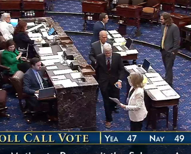 jamiedupree's tweet photo. Tillis &amp; Cassidy hand off papers to the Senate Parliamentarian, who then takes them off the floor for a chat https://t.co/LbTp8fq9HV