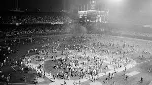 wirefallssports's tweet photo. On June 4, 1974, Cleveland’s infamous Ten Cent Beer Night turned into one of the wildest nights in MLB history. Fans stormed the field during an Indians-Rangers game, and Cleveland was forced to forfeit. https://t.co/pYwt7pTyqd