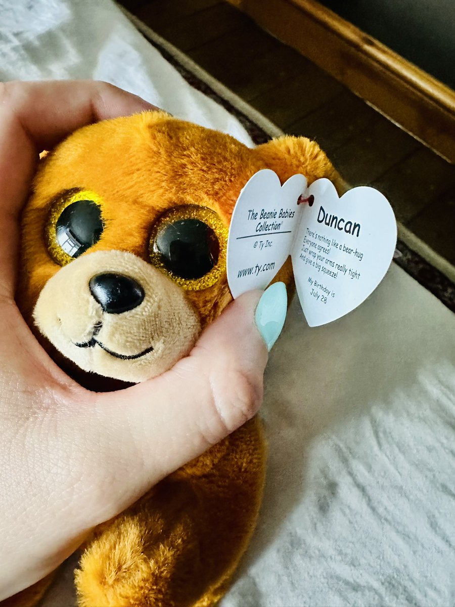 hugedancy's tweet photo. my son has had this bear for a year and I've never noticed what his name is and I squeaked out loud https://t.co/GJBPvfz8Gw