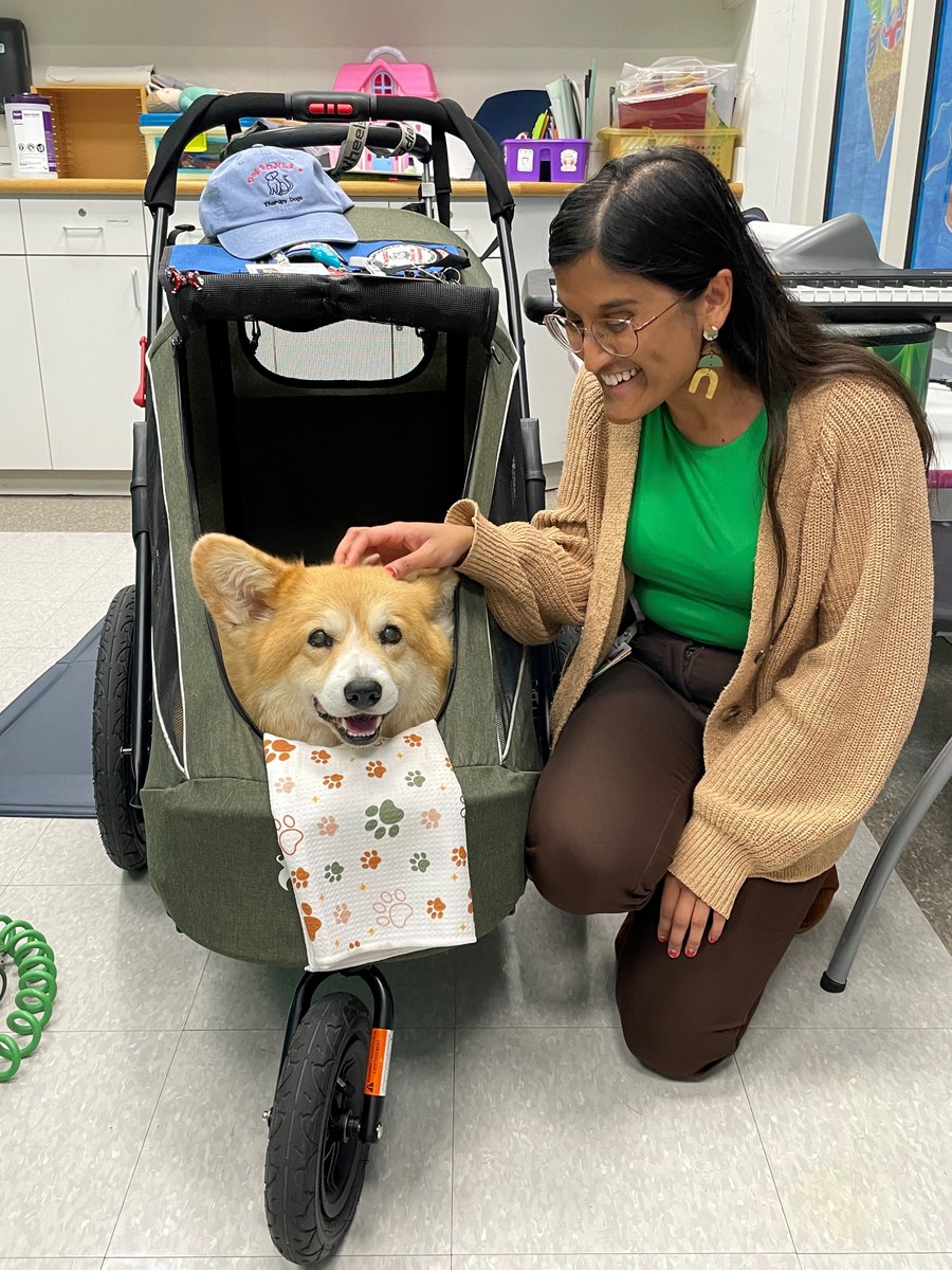 ShrinersBoston's tweet photo. We are celebrating #InternationalCorgiDay by introducing you to one of our pet therapy dogs, Ella and her friend Anamika, a clinical psychology doctoral student at @ShrinersBoston. Anamika loves that Ella provides comfort and joy to the patients who visit our hospital. ❤️ https://t.co/KJfXl68bBb