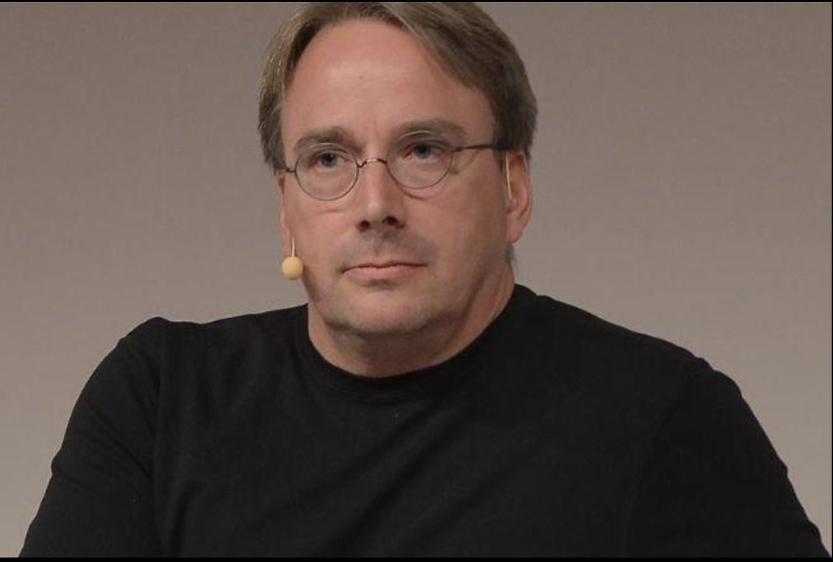 twtayaan's tweet photo. The creator of Linux just publicly called out the AI hype. Word for word.

Linus Torvalds took the stage at Open Source Summit 2026 and said this:

"When I see people saying 99% of our code is written by AI, I literally get angry. Because those same people — I can pretty much guarantee — 100% of their code is written by compilers. But they never say that."

He is not anti AI. The Linux kernel saw a 20% jump in submissions this release because of AI tools. He uses it. He gets it.

His point is something most people are too afraid to say.

AI is a productivity tool exactly like compilers were. Compilers boosted programming by 1000x. AI adds another 10x on top. Enormous. But nobody says "the compiler wrote my code." So why are we saying AI wrote it?

He also flagged something nobody is talking about.

AI is flooding small open source projects with drive-by bug reports. Someone runs a prompt, files a report and disappears when asked for a patch. Maintainers with one or two people are drowning trying to keep up.

"Sometimes AI reports a bug and when you ask for more information the person has done that drive-by and does not even answer your question. That is the real burnout issue."

And his final warning was the sharpest of all.

"People who do not understand the complexity of systems will prompt systems and write processes that will fail."

The AI hype crowd is very loud right now.

Linus has been building real systems for 35 years. When he talks, engineers listen.

Full interview here:
https://t.co/LmXJtvKc4O
