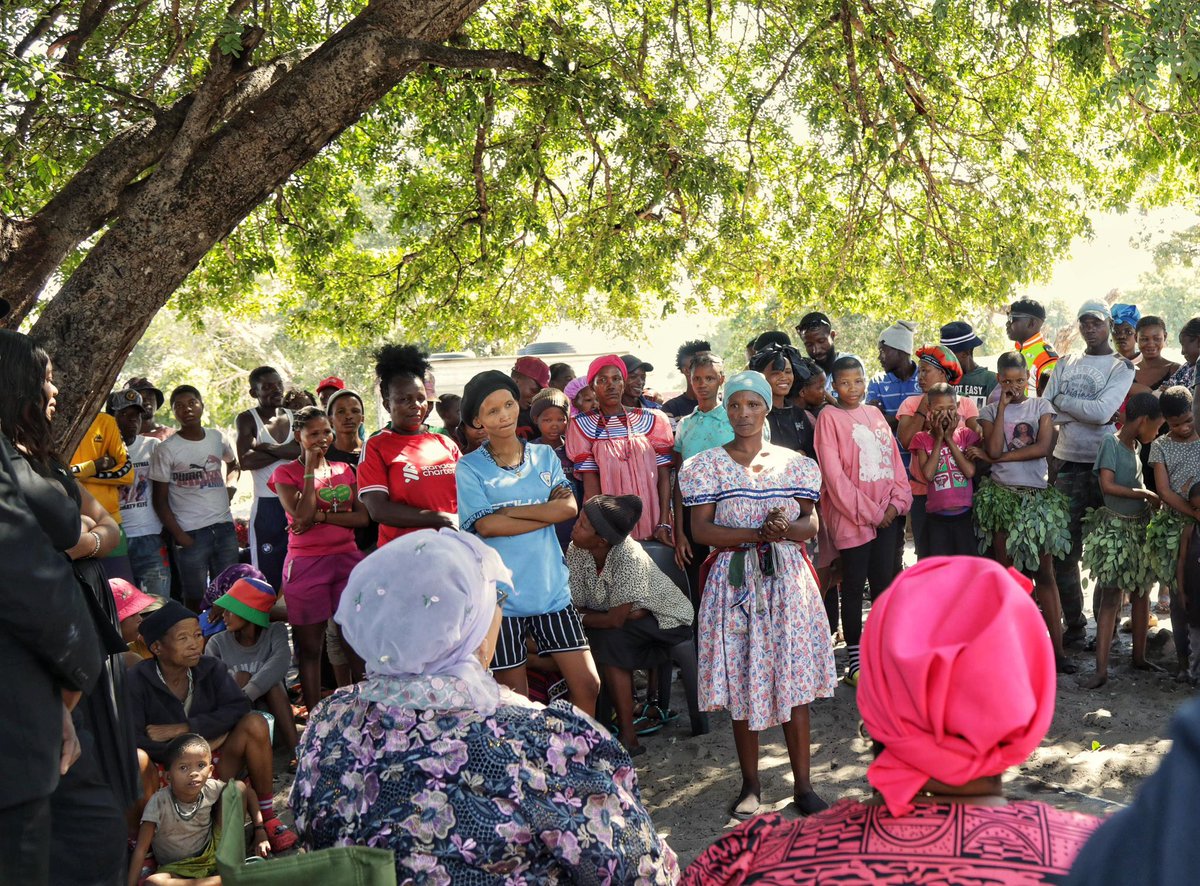 VPofNamibia's tweet photo. Vice President Lucia Witbooi today visited the San Community at Ombili Location in Eenhana to engage residents and assess the living conditions and socio-economic challenges facing the community.

During the visit, community members raised concerns relating to access to water, electricity, sanitation, housing, and serviced land for gardening and small-scale farming initiatives aimed at improving livelihoods and food security.

The engagement also highlighted social challenges affecting the community, including alcohol abuse, gender-based violence, school attendance among children, and concerns that some elderly persons are being deprived of the benefits of their pension grants due to exploitation and alcohol-related challenges within the community. 

Officials informed the Vice President that Government currently provides transport for approximately 60 learners from the area to attend school, while three students from the San community successfully graduated from the International University of Management (IUM) Ongwediva Campus last year through Government-supported programmes.