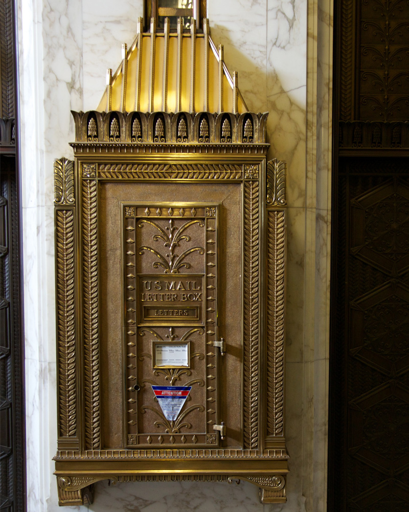 archpng's tweet photo. Inside Pittsburgh’s Koppers Building, even the mailbox was designed like a miniature skyscraper.

This Art Deco letter box in the lobby echoes the building itself, complete with a tiny version of its distinctive steep roof. Completed in 1929, the Koppers Building carried its design language through marble, bronze, geometry — and even the place where people dropped their mail.