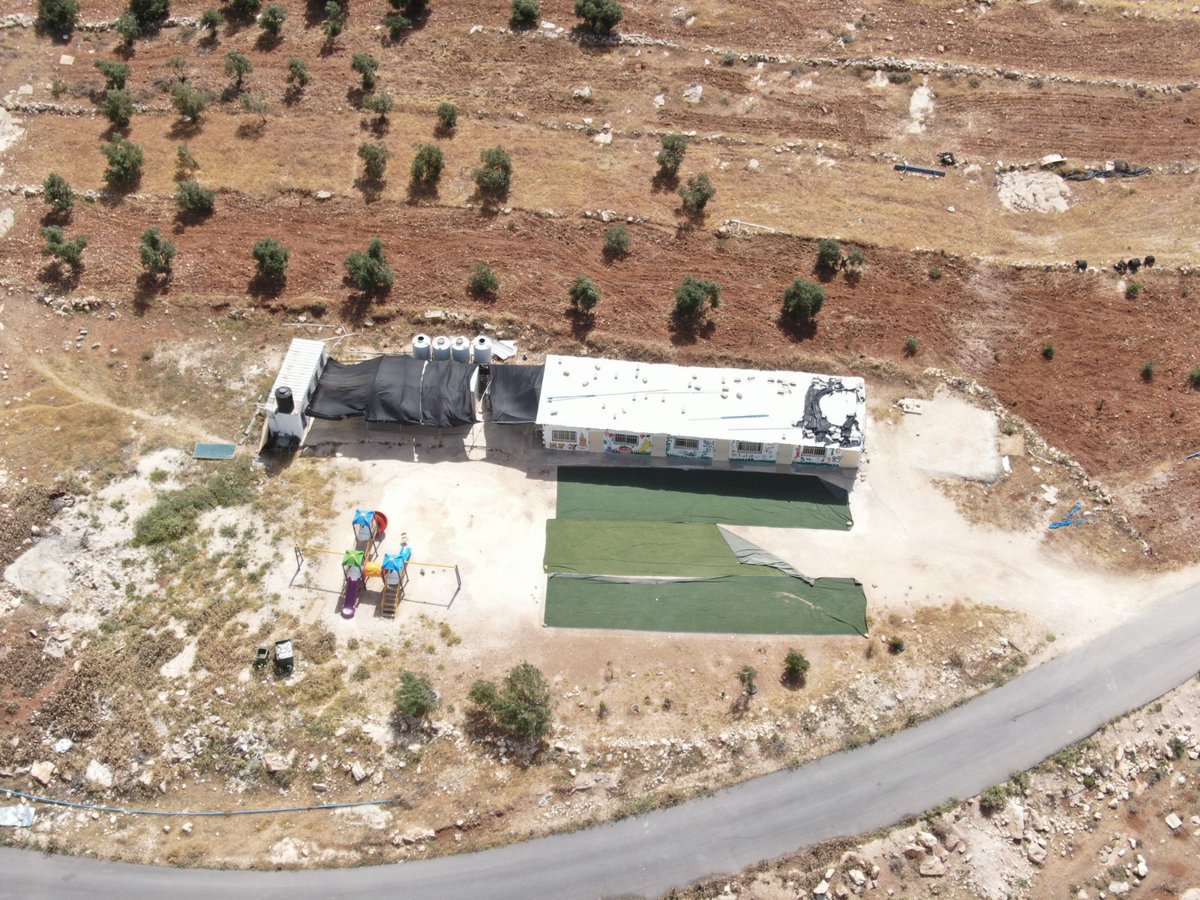 RegavimEng's tweet photo. BREAKING: The EU just revealed why it sanctioned Regavim.

Our “crime”? Petitioning Israeli courts against an illegal EU-built structure near Herodium, on the edge of the Judean Desert Nature Reserve, after a professional engineering assessment found it posed a safety hazard to the children and staff inside.

So now it’s official: the EU builds illegally, Israel enforces the law, and Regavim gets sanctioned for exposing it.