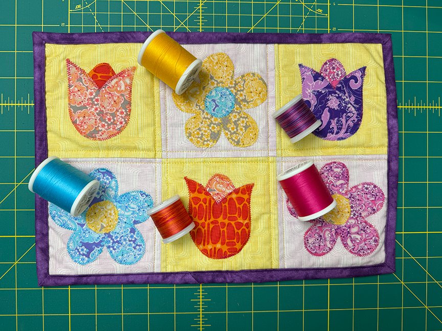 Sit_N_Sew's tweet photo. Looking for a quick quilting project with BIG color impact? 🌼

Our Flower Garden applique mini quilt is easy to customize and beginner-friendly.

🎥 Watch the tutorial:
https://t.co/lXMtbadW80
🧵 Shop 5” squares:
https://t.co/rjfXcRMjX6

#quilt #fabric #quiltingcommunity https://t.co/lbhEcjMhFO