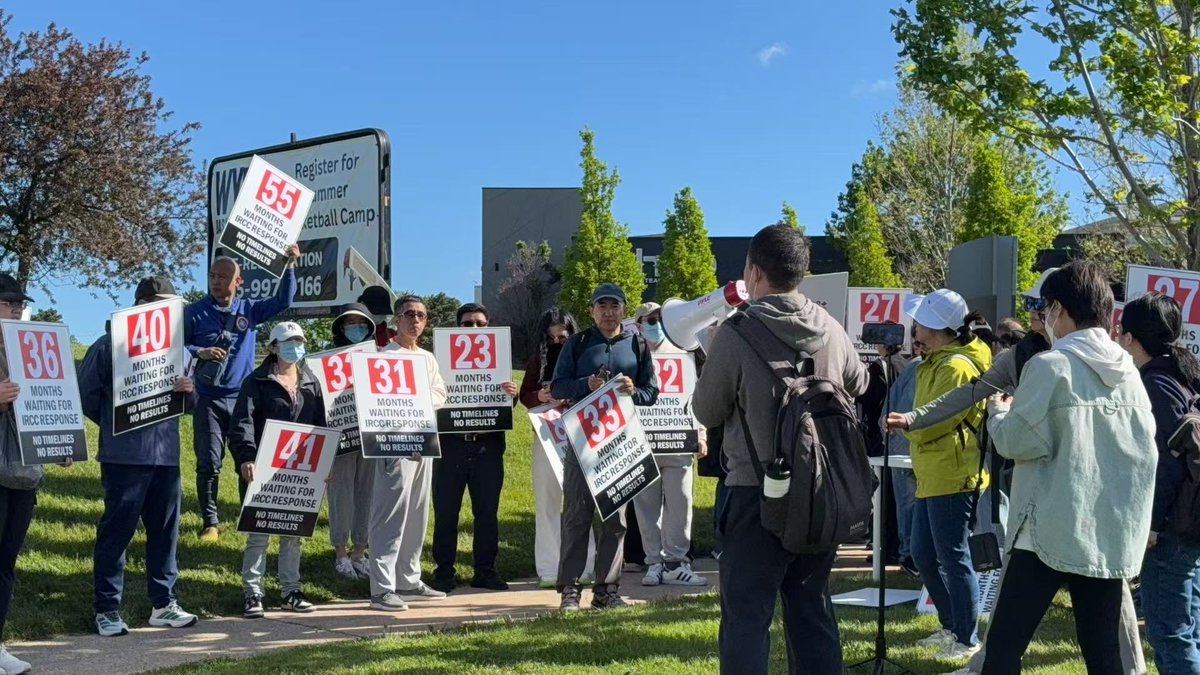 VoicesFairCheck's tweet photo. Today, we gather in Toronto to protest against indefinite security screenings! Every sign and speech here tells the story of our real struggles. We demand that IRCC clear the backlog and stop making applicants suffer. The wait has been too long. #IRCC #cdnpoli #cdnimm #CBCNews https://t.co/f4hxWxzbRw