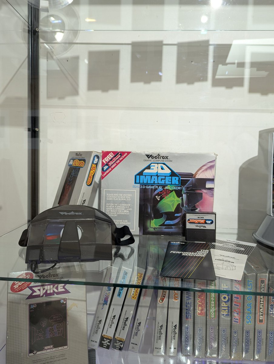 VectrexOn's tweet photo. A Vectrex collection on display. 🕹️✨

Featuring a Vectrex Mini prototype, the 3D Imager, the Light Pen, and a stack of games. https://t.co/DVqN8Or87y
