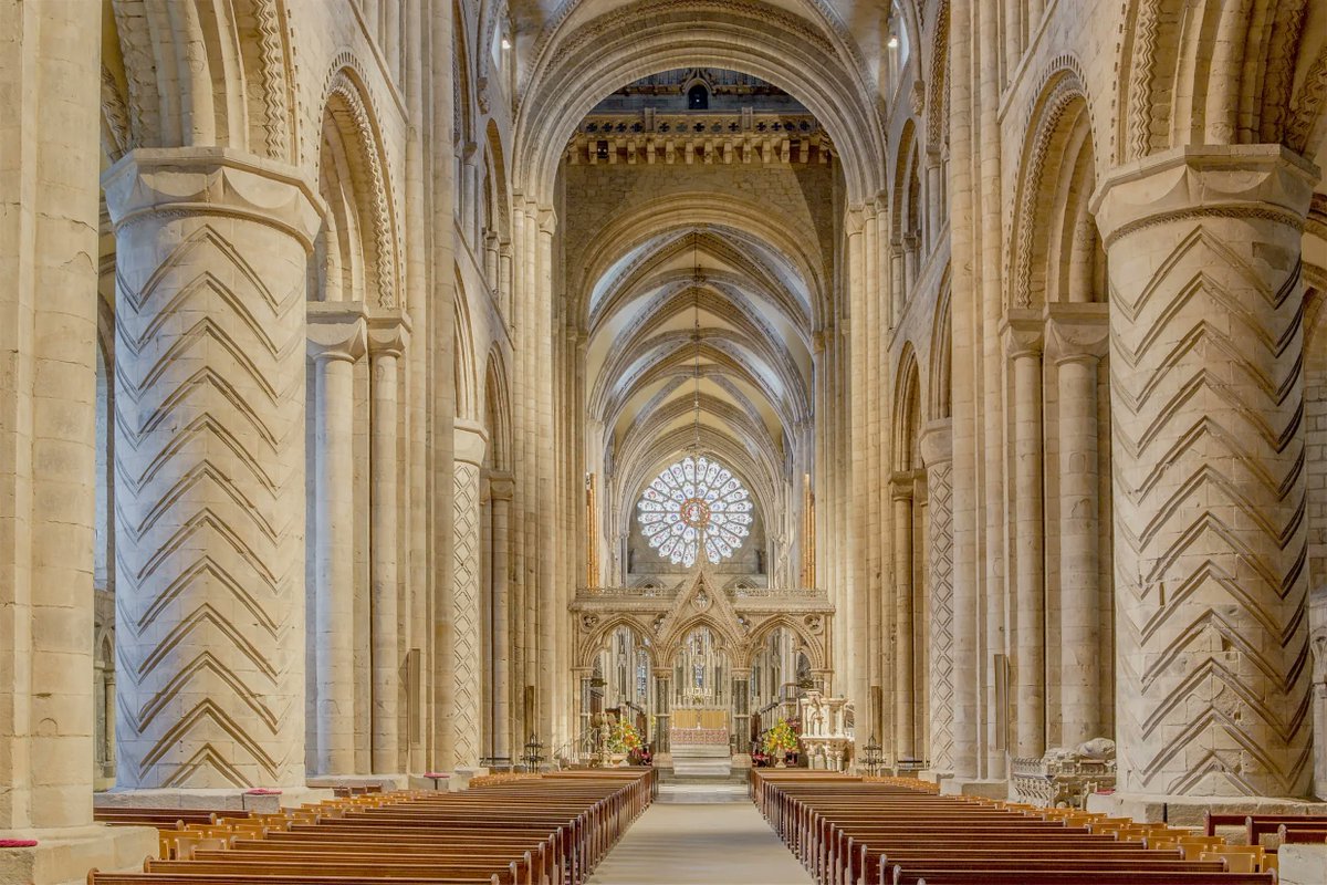 ArkaSerezh's tweet photo. Durham Cathedral was one of the first major buildings in England to use rib vaulting at scale.

Stone was quarried outside the city, transported by river, then raised through timber scaffolding and hoists beginning in 1093.

The structure still carries its original system of load.