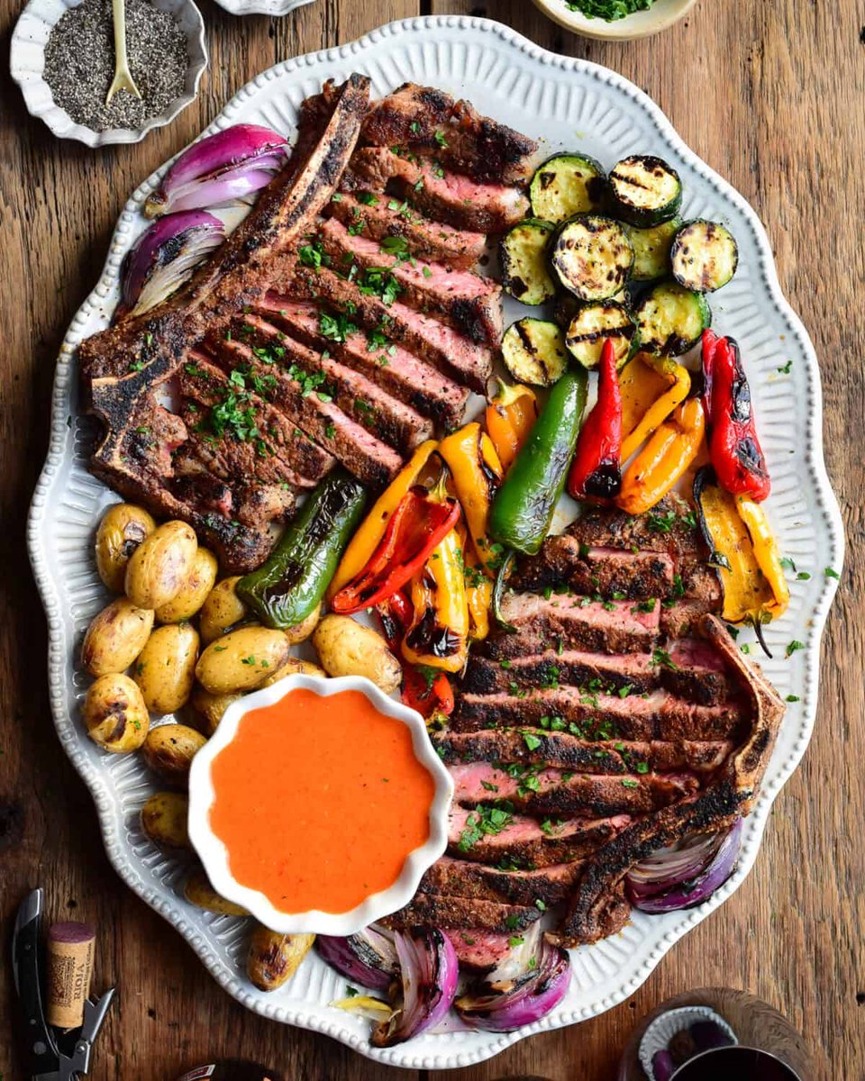 Zimmysnook's tweet photo. These Spanish-Style Steaks are coated in a smoky paprika &amp; citrus rub, grilled until beautifully charred, then finished with a vibrant roasted red pepper sauce that’s sweet, smoky &amp; tangy.
Recipe: https://t.co/1TgxKz5sxu

#foodie #grilling #steak #grilledveggies https://t.co/OWx7eh7cXt