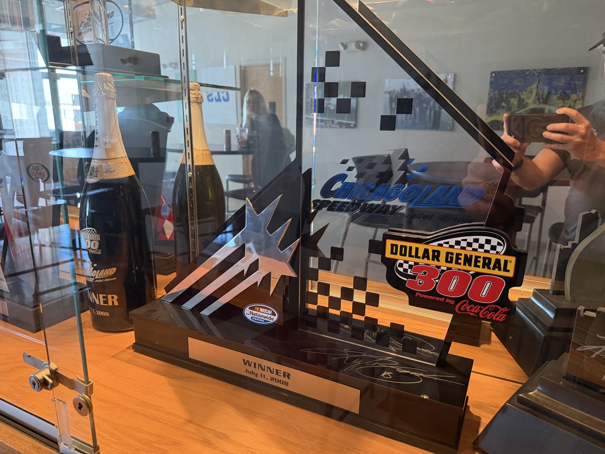 SpotterRick's tweet photo. NASCAR is back at @ChicagolndSpdwy after a 7-yr hiatus.  I’m here for the next 3 days w/ @NASCARRacingExp and noticed Kyle Busch’s July 2008 Nationwide trophy and his Sprint Cup trophy he won the very next day in the media center. https://t.co/NlBaOdT2YL