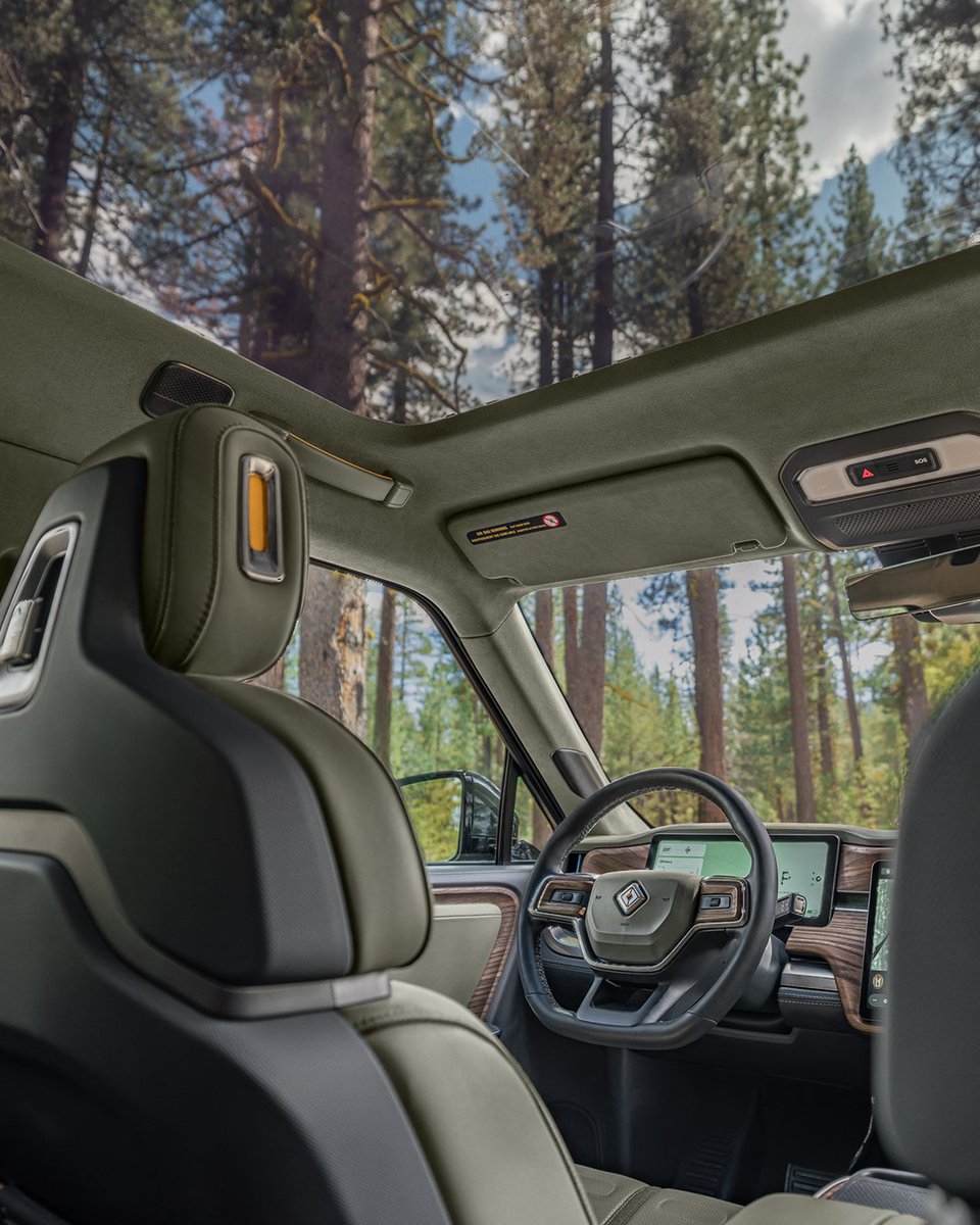 Rivian's tweet photo. Step into the wild with our limited edition Forest Edge R1 interior. Calm green, warm wood and subtle metallic accents catch the light just like a sun-dappled trail. 

Available with select exterior color and wheel pairings, Forest Edge will only be here for a limited time. 

Learn more: https://t.co/Ug8ksz4eV2