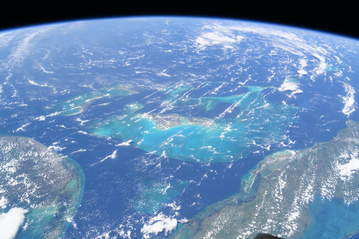 NASAJohnson's tweet photo. Where are you spending your summer days? 🏖️

If you can’t constantly keep your toes in the sand, here are some photos to enjoy as the International @Space_Station orbited approximately 250 miles over popular beach destinations. Do you recognize any of these getaways? https://t.co/kJ8lsrLWh2