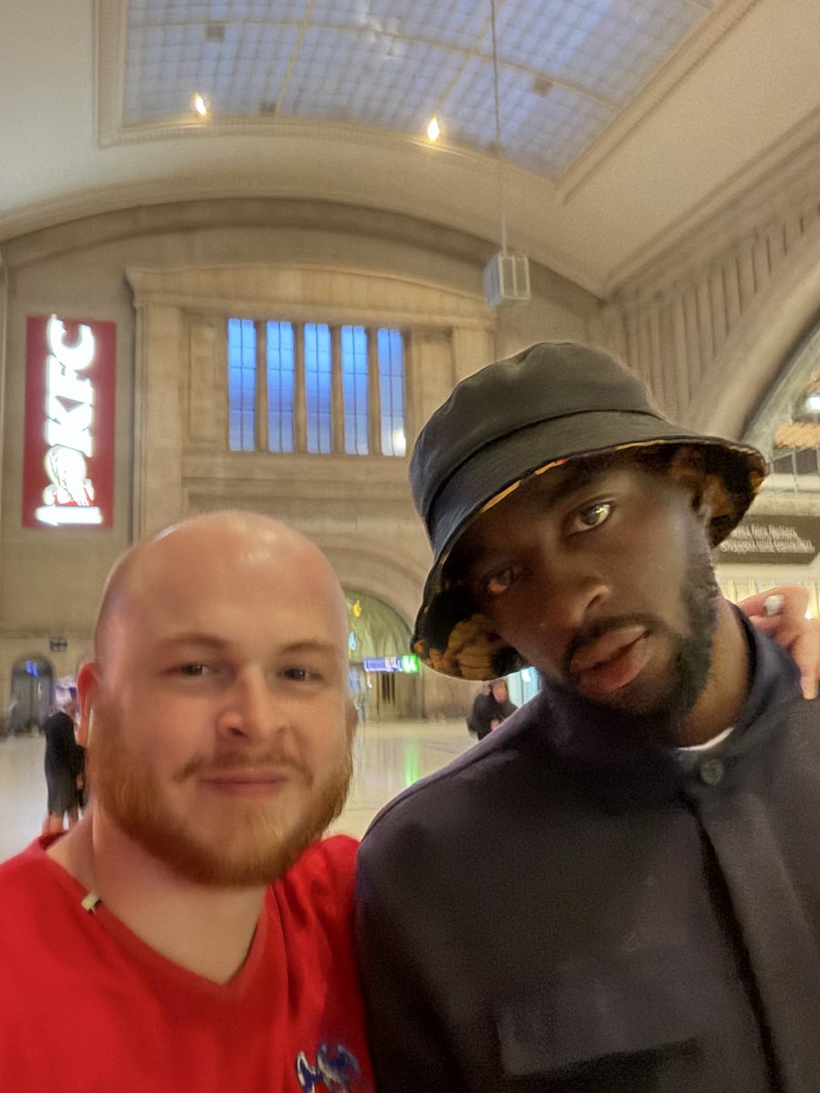 Billy_Meyers98's tweet photo. Even Mateta fell victim to that mess of a 24/7 McDonald’s in Leipzig station at 5am, just hours after the final

He got fed up and walked out, but managed to grab a quick selfie with (a quite annoyed looking) JP as he was leaving 

Hope he got his deserved Big Mac elsewhere 🍔 https://t.co/Xw53mE0fdD