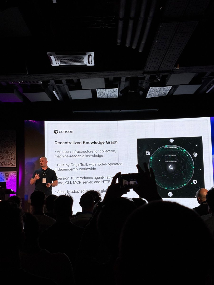 origin_trail's tweet photo. Packed room at today's @cursor_ai meetup in Ljubljana, with @BranaRakic showing Decentralized Knowledge Graph V10 live on stage! 

The shift is clear: builders no longer want to just spend tokens - they want compounding value.

Shared context graphs are how. https://t.co/RdGAeZ0Jzd