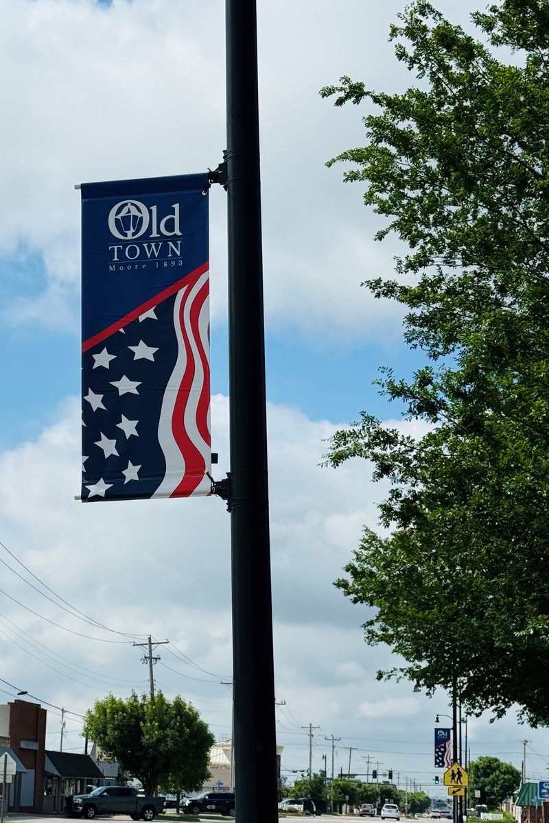 cityofmoore's tweet photo. As America celebrates its 250th birthday, Moore is proud to showcase new patriotic banners in Old Town Moore.  From sea to shining sea, we celebrate the values and history that unite us. Check out the banners flying through 2026! https://t.co/PIR99Pw9FW