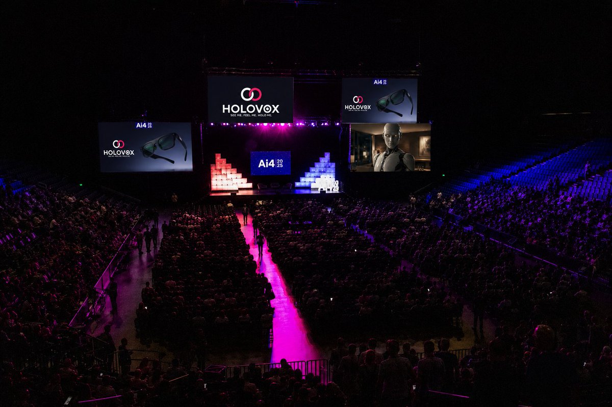 HoloAtMe's tweet photo. Something big is happening in Vegas this August.
HOLOVOX is officially on the Innovation Stage at @Ai4Conference — August 4-6 at The Venetian.
12,000 people. The biggest AI conference in North America.
And we're about to show them what a Human/AI Hybrid actually looks like. Live. On stage.
🔥 Thread below.