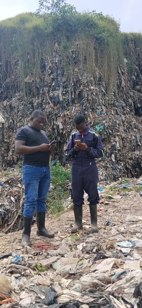 HakiDataLab's tweet photo. Haki Data Lab Team conducting drone data truthing of their 3D data of the Dandora Dumpsite using the ArcGis Survey 123 tool. 
The site, while offering a source of livelihood to many waste pickers, continues to be a health hazard to the Dandora community. @data4change @werobotics https://t.co/mPo0TcAoGz