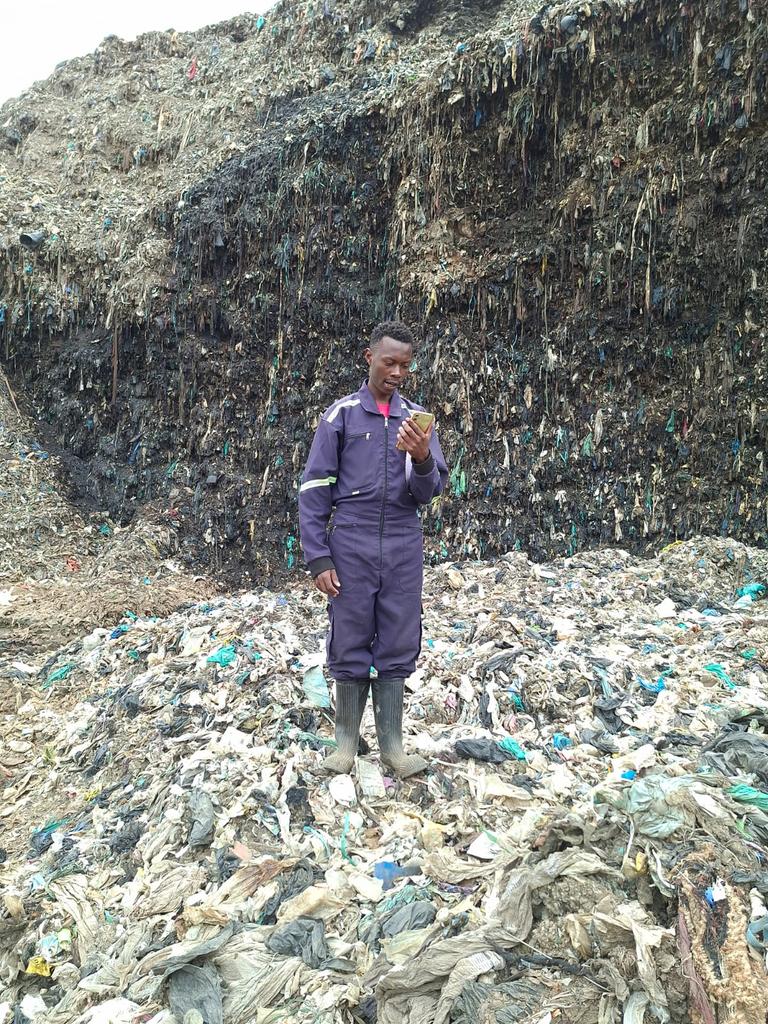 HakiDataLab's tweet photo. Haki Data Lab Team conducting drone data truthing of their 3D data of the Dandora Dumpsite using the ArcGis Survey 123 tool. 
The site, while offering a source of livelihood to many waste pickers, continues to be a health hazard to the Dandora community. @data4change @werobotics https://t.co/mPo0TcAoGz