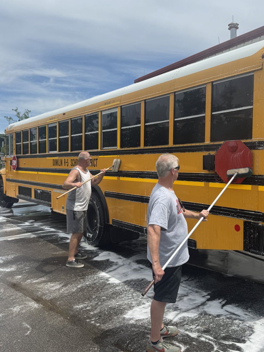 DrClintFreeman's tweet photo. Do you ever wonder what bus drivers do in the summer?  Some of our drivers are driving summer school routes,  and today they are washing buses. We have to take care of what we have. #GoBlackcats @BlackcatMatt @JoeFWillis https://t.co/Leau1Mf00W