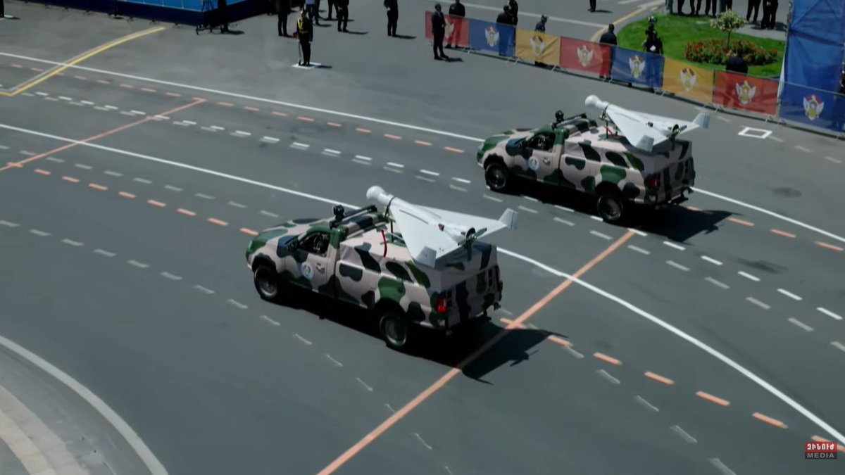 HovhanNaz's tweet photo. another likely Chinese system at today's Armenian military parade: a radar-hunting suicide drone that resembles the ASN-301 and its truck-mounted launchers https://t.co/iOHWbAL1ng