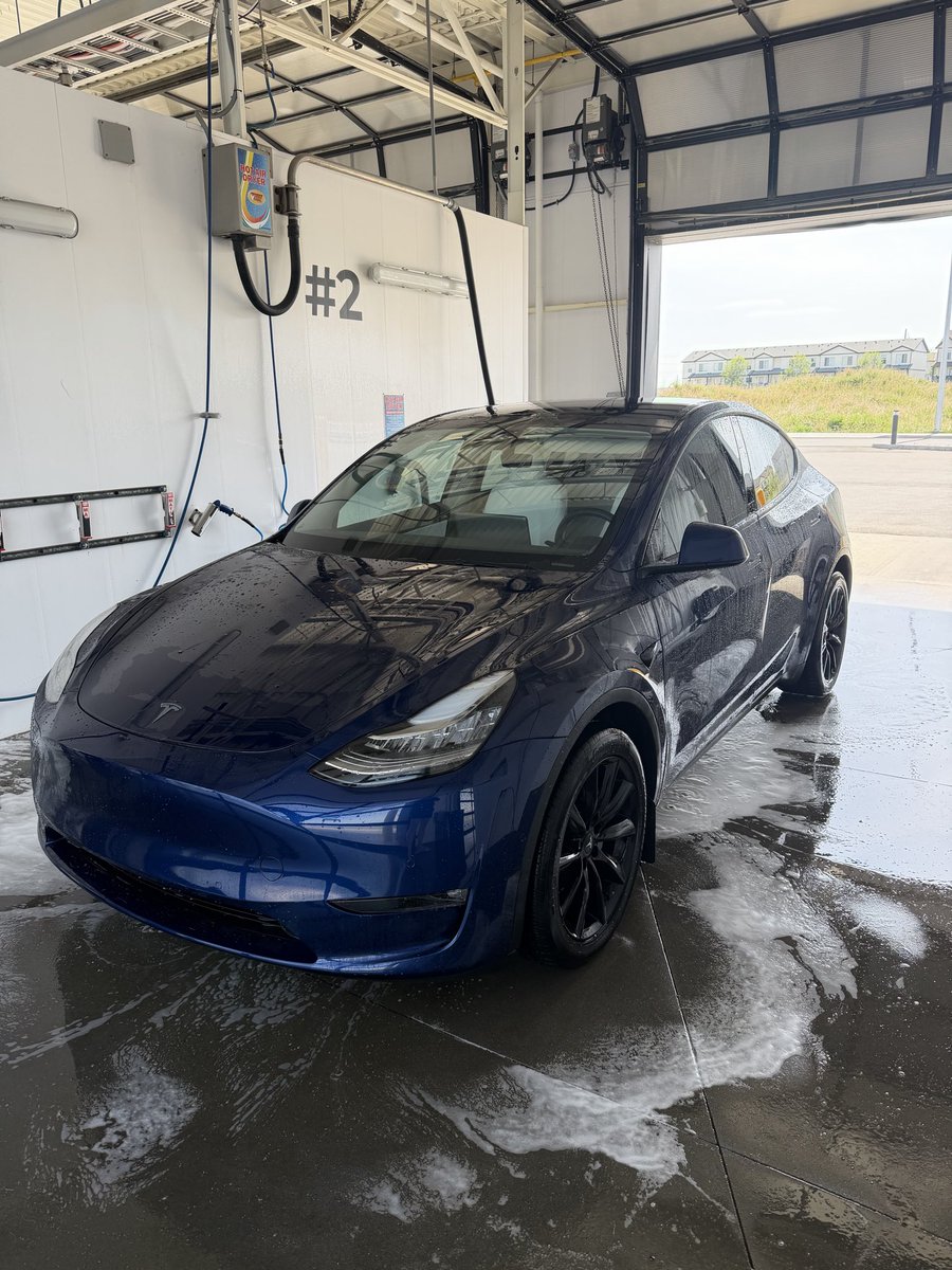 AngDean23's tweet photo. I can’t get over how easy it is to own this car. Not only did it drive me here but after it pulls in, she says “I still got you” and offers car wash mode. THIS CAR TURNED FOUR YEARS OLD LAST WEEK! And it’s just getting better and better. Incredible. Thank you @Tesla& @Tesla_AI ! And Happy Birthday. Booberry! 🫐🎉