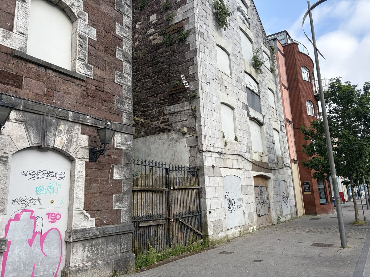 REBELC0RK's tweet photo. Welcome to Cork 🔴⚪️ the first thing the tourists see after getting off a bus is dereliction everywhere 🤮@corkcitycouncil https://t.co/pLDDwugoVH