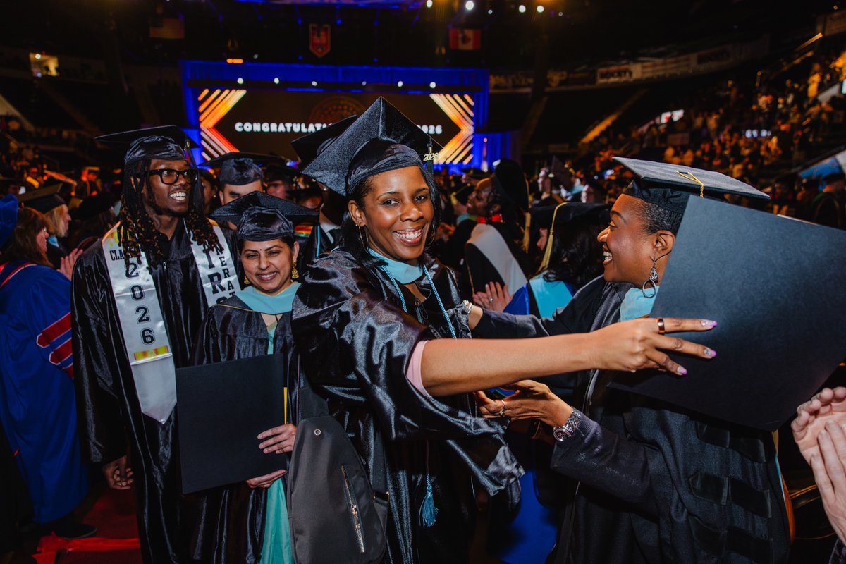 AIConcampus's tweet photo. The #AIC graduate send-off tradition continued at the 2026 Commencement 🎓

We were proud to welcome back Devonte Dillion ’17, MBA ’19 as our alumni speaker, officially welcoming #AIC2026 into the Yellow Jackets alumni family 🐝

Always remember: One Hive, One Family 💛🖤 https://t.co/0Tlue7vpvu