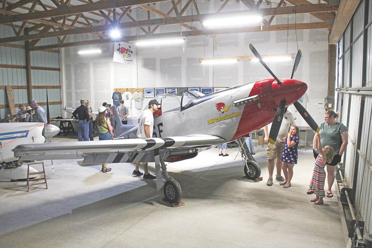 SethBoyes's tweet photo. Had a photo-heavy Memorial Day schedule, and my part was just the high school band, Calmar ceremony and a replica P-51 Mustang that was on display. Altogether, our staff’s work made for some great pages in this week’s paper. https://t.co/fizoxN2Pyn