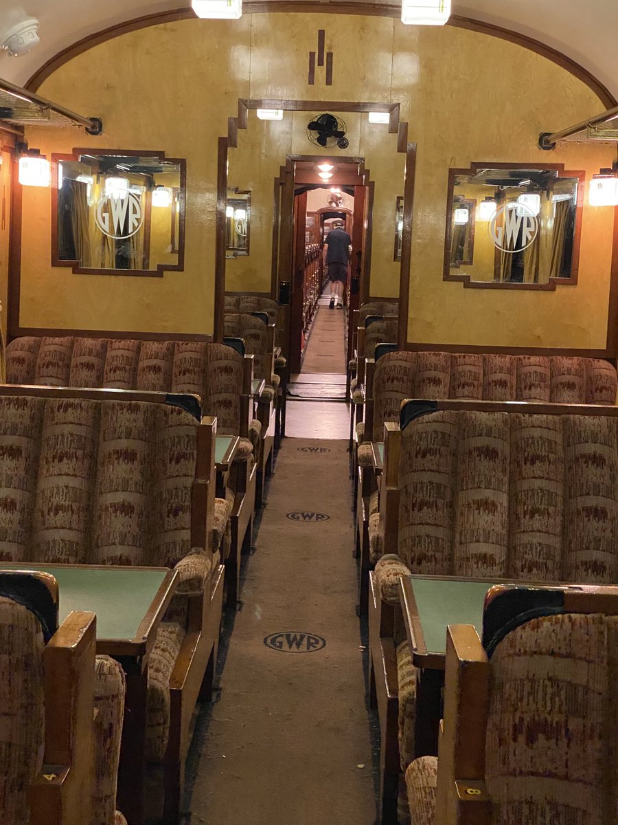 CrecyRail's tweet photo. Today’s office was the exquisite GWR brake No 650. With the lights on going through Bewdley tunnel, its beautiful art deco interior looks superb, you’d almost expect to see Hercule Poirot shuffling along the corridor. The exterior view certainly wasn’t taken today! Scorchio! https://t.co/6kBrJJrH3J