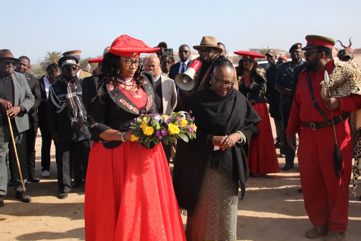 MIRT_NAMIBIA's tweet photo. Honourable Selma Ashipala-Musavyi, together with the Governor of the Erongo Region, Honourable Natalia /Goagoses, traditional leaders and other high-ranking officials in the region participated in wreath laying ceremonies at the historical gravesite. https://t.co/QvLVUXRbzQ
