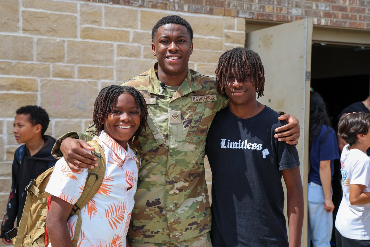 NorthwestISD's tweet photo. After spending a year deployed with the U.S. Air Force, 2023 Eaton grad Dezmon Smith made the trip home — surprising his two younger brothers, Dillon (Adams Middle) and Damion (Berkshire Elementary), on the final day of school.

Welcome home, Dezmon!

📸 https://t.co/ZxH4XnxtD7 https://t.co/vL2r2Sy0X9