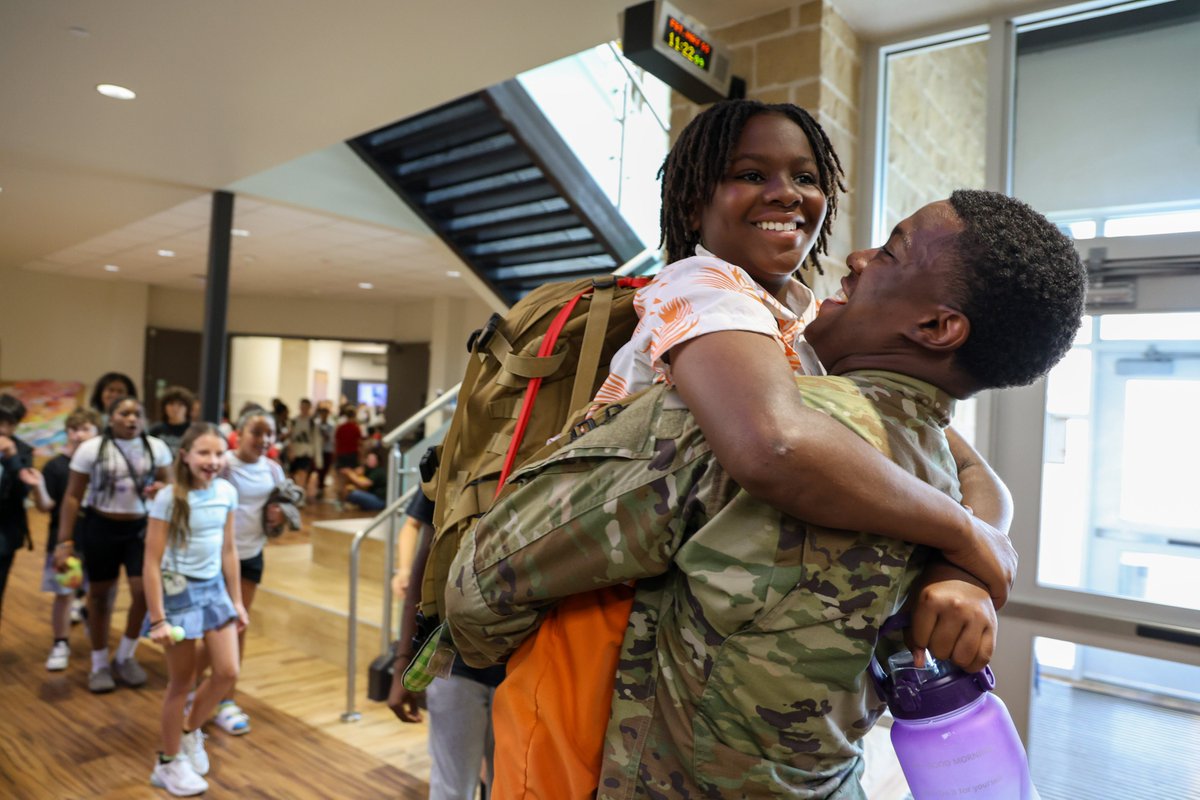 NorthwestISD's tweet photo. After spending a year deployed with the U.S. Air Force, 2023 Eaton grad Dezmon Smith made the trip home — surprising his two younger brothers, Dillon (Adams Middle) and Damion (Berkshire Elementary), on the final day of school.

Welcome home, Dezmon!

📸 https://t.co/ZxH4XnxtD7 https://t.co/vL2r2Sy0X9