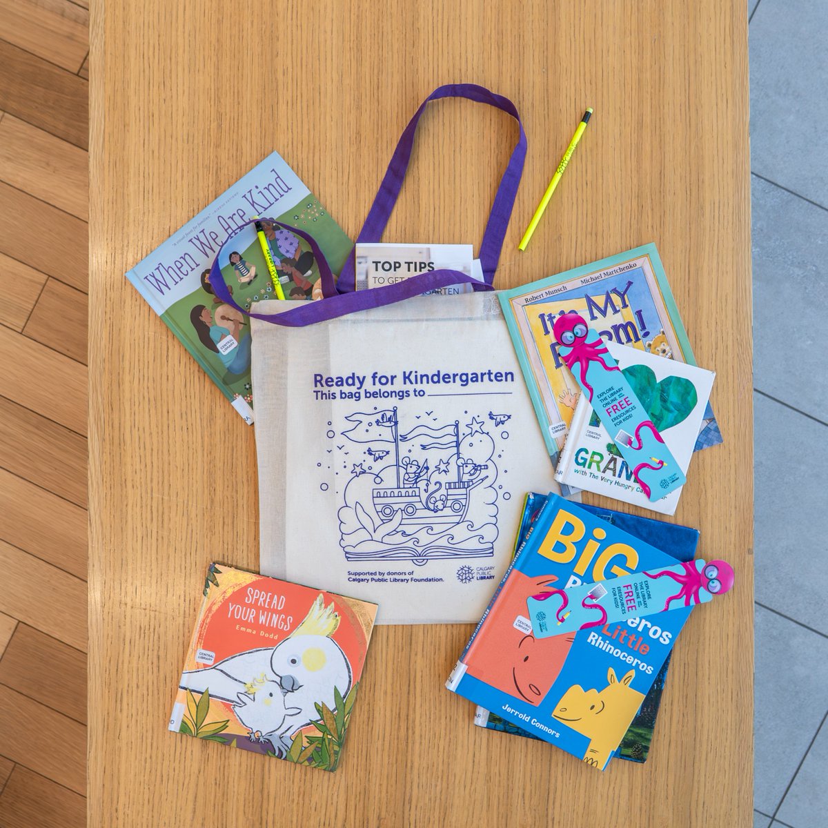 calgarylibrary's tweet photo. Meneka Repka was the Library’s 2025 Children’s Illustrator in Residence and designed this year’s Kindergarten Book Bag. Repka drew on her own memories from kindergarten and the feelings of excitement that you have when you start school and are learning how to read. Learn more: https://t.co/FkPkKUU8L5

#CalgaryLibrary #KindergartenBookBag