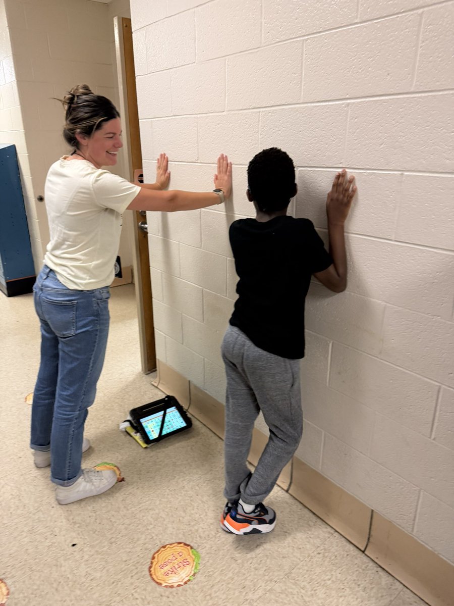 SevernESAACPS's tweet photo. We love a wall push-ups challenge! Who do you think was victorious, Mrs. Dammeyer or this scholar??!! https://t.co/Q3taycjf6J
