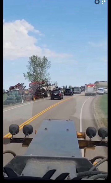 buperac's tweet photo. Holy shit!

Wing came down on a drill and right into the cab of semi hauling fuel around Hardisty. 
The driver lived and the tank never exploded. 
Wow. 

Remember to lock out your hydraulics and ensure you are winged up all the way before transport. Pin them in for long hauls. https://t.co/VJHa7KFa98