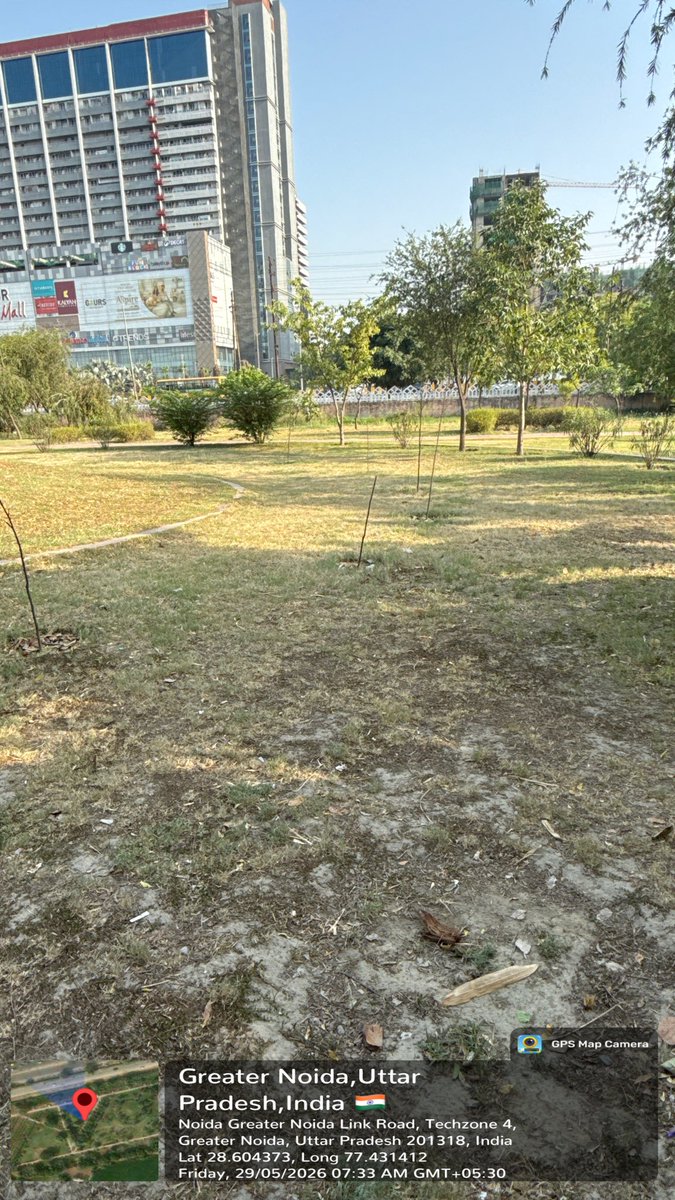 Simpli_vaibhav's tweet photo. GNIDA park opposite Gaur City Mall is in terrible condition. No watering, plants are dying, walking paths are broken, and open gym equipment is damaged. Since the maintenance contract expired, no one is maintaining the park.
Requesting @OfficialGNIDA to take immediate action. https://t.co/OWnL0DTBAw