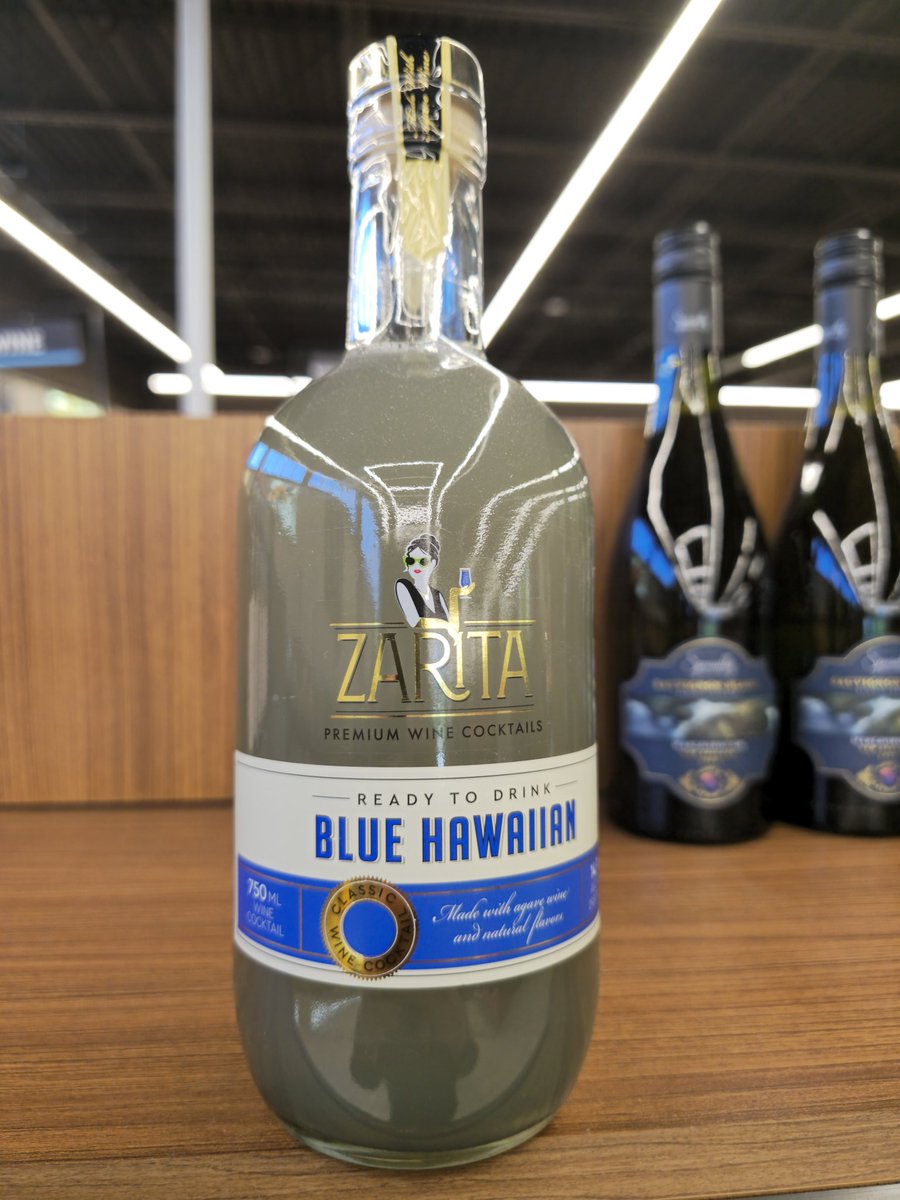 Hey @AldiUSA one characteristic of a "Blue" Hawaiian is that it is...well,  BLUE. What is this? #aldi #tiki #cocktails
