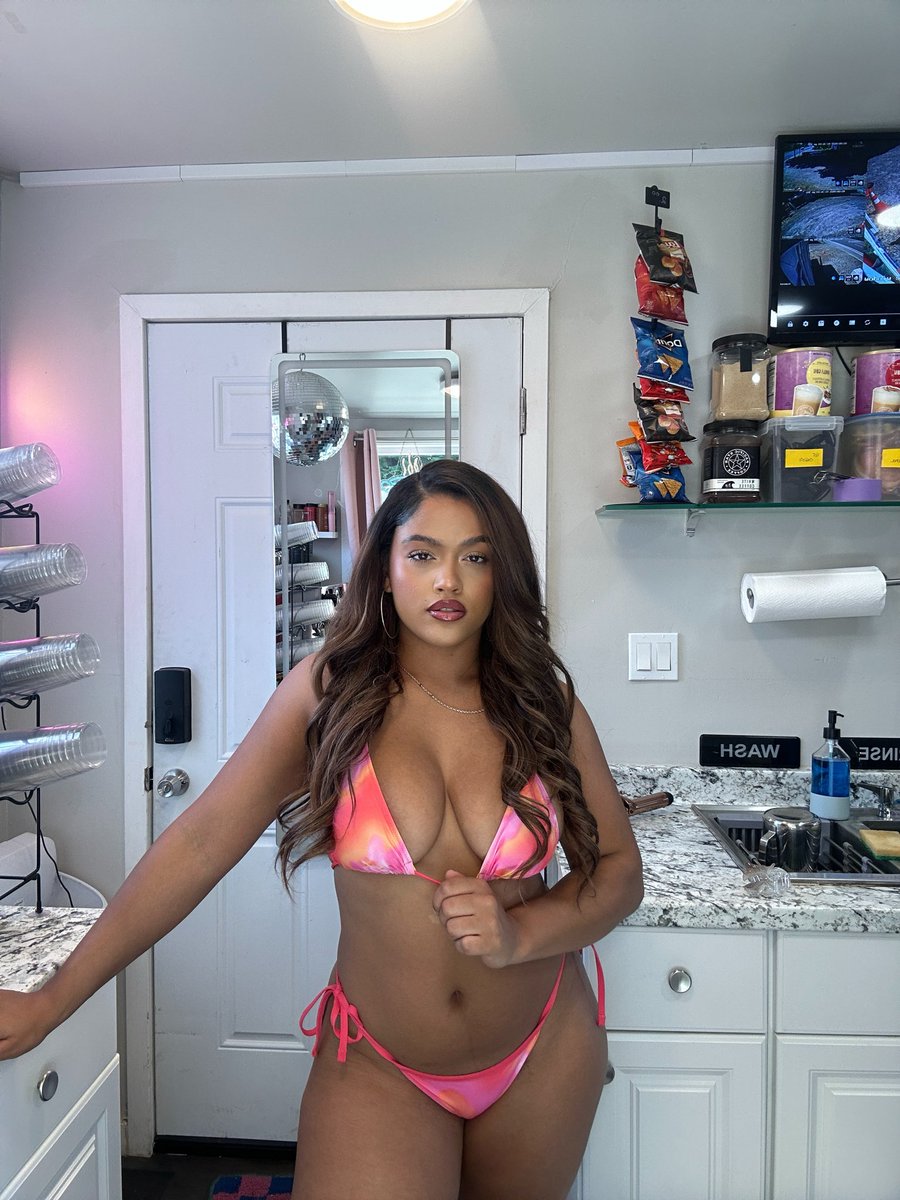 Melathebarista's tweet photo. It’s sunny so I have to be in a bikini I don’t make the rules 🧡🩷#bikini #barista https://t.co/geTl3Wch75