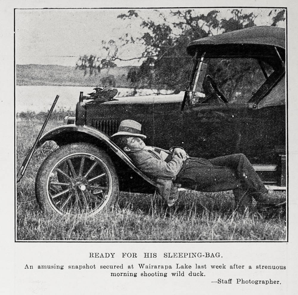 AkWeeklyNews's tweet photo. Ready for his sleeping-bag. An amusing snapshot secured at Wairarapa Lake last week after a strenuous morning shooting wild duck.    https://t.co/BsudEX7KOx https://t.co/ReXKJVIFJz