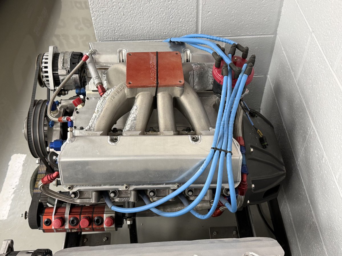 kwc74's tweet photo. We visited the RCR museum this past week and noticed a unique engine on display.  It appears to be a small block chevy, short block, with Ford SVO heads. No one working had any knowledge of it. What's the story? https://t.co/qca6HUKKMJ