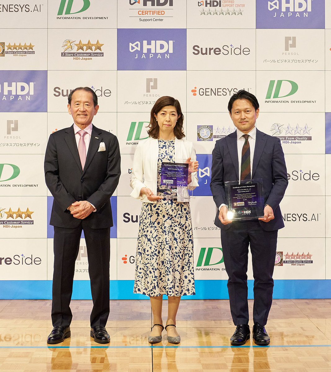 mizuho_sc_x's tweet photo. 5月20日（水）、「HDIアワード2026」授賞式が京王プラザホテル東京にて開催されました。

#みずほ証券 は、「問合せ窓口格付け」では10年連続、「Webサポート格付け」では9年連続で最高評価である「三つ星」を獲得しました。さらにHDIが定める基準をクリアした「五つ星認証」取得企業として5年連続で表彰されました！

詳細はこちらをご覧ください👇
https://t.co/2dwlg39Zwk