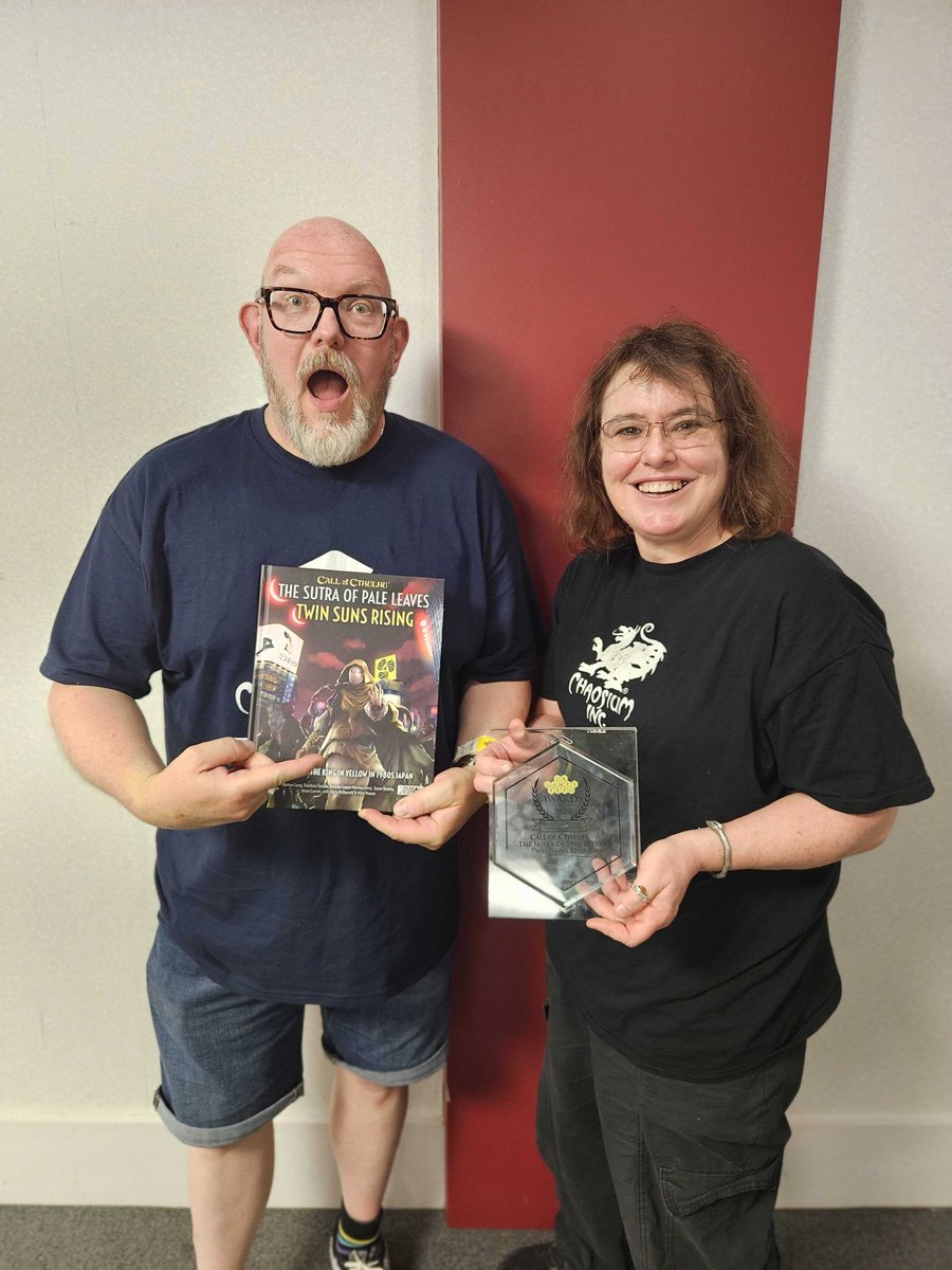Chaosium_Inc's tweet photo. Winner! - Call of Cthulhu's The Sutra of Pale Leaves won the Judge's Choice Award for Best Roleplaying Adventure in the 2026 @UKGamesExpo Awards. Chaosium's Mike Mason and Keris McDonald were presented the award in Birmingham last night. https://t.co/Zhu2Q1T04C