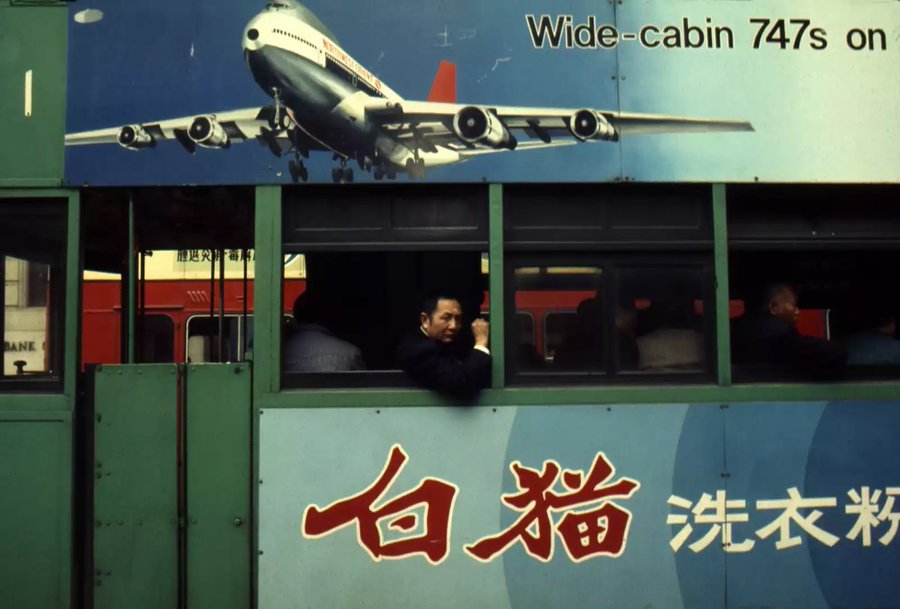 LKpaddy's tweet photo. Tram with Northwest Airlines advertisement, Hong Kong, 1975 • Greg Girard • https://t.co/mxterp1LNw