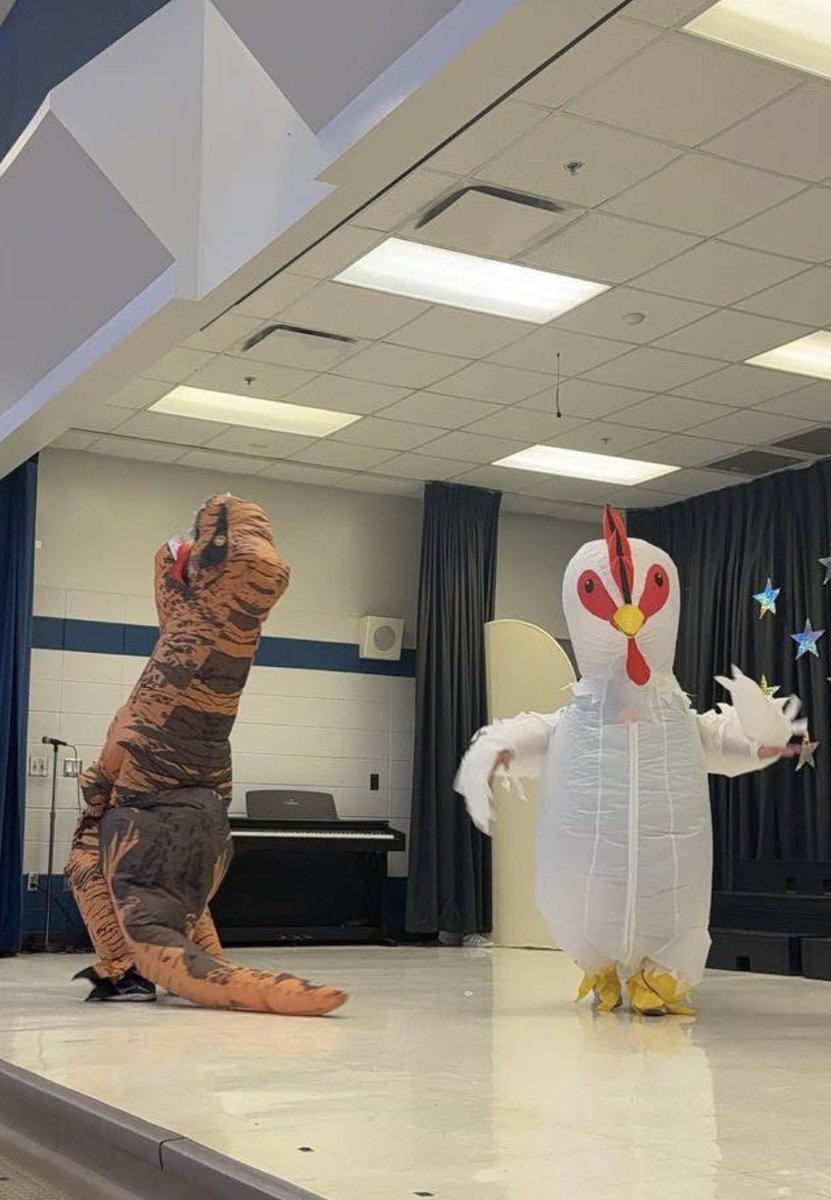 MsJennaMorrell's tweet photo. Just when you think you’ve had enough fun for one year, you find yourself in a chicken costume…on a stage! #talentshow @jtownelementary @JtownElemAP https://t.co/WangXNakPQ