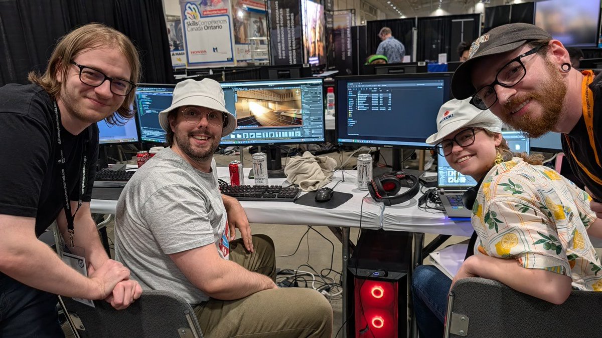 NCgameDev's tweet photo. Pretty awesome first day for the Niagara College team getting to demo the new @Skills_Canada game development competition! Yes that is a rocket launcher in the background!😄 #ncLife #NiagaraCollege https://t.co/cd2InWat9z